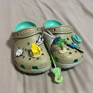 CROCS Kids Sandals in Gold with Green Accents